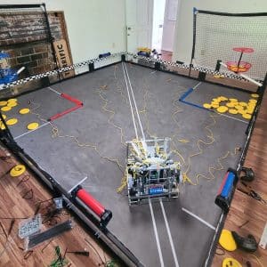 VEX robot with strings covering the floor